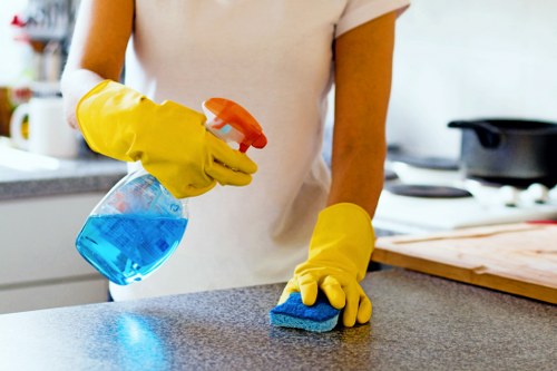 Professional Airbnb cleaner preparing a guest-ready property in Surrey
